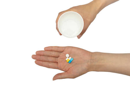 Concept on the palm of the hand for taking various pillsの写真素材
