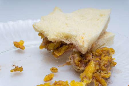 Leftover sandwich bread in a glass bowの写真素材