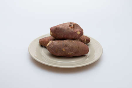 Roasted sweet potatoes on a plate that looks delicious