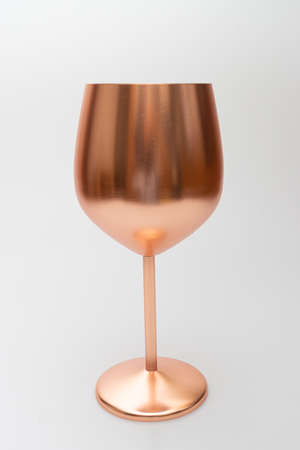 yellow stainless steel wine glassの写真素材