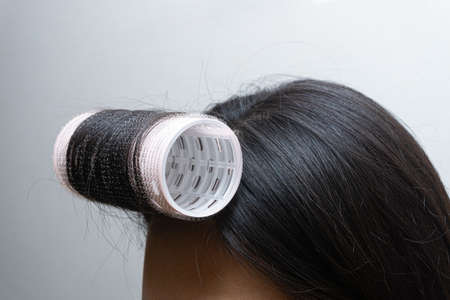 hair rolls for beauty products on a white backgroundの写真素材