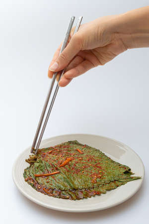 Stewed sesame leaf seasoning neatly in a bowlの写真素材