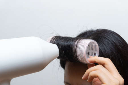 hair rolls for beauty products on a white backgroundの写真素材