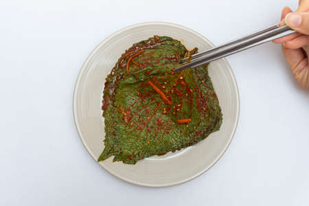 Stewed sesame leaf seasoning neatly in a bowlの写真素材