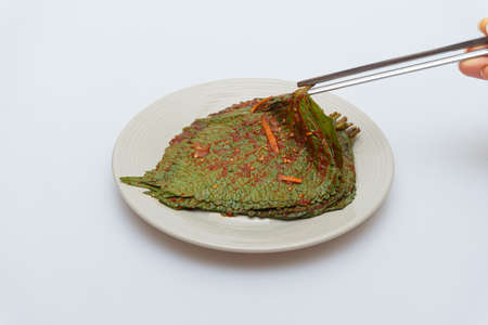 Stewed sesame leaf seasoning neatly in a bowlの写真素材