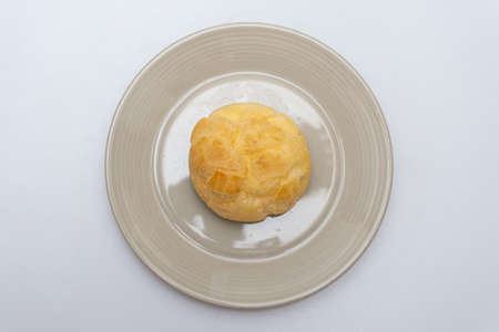 Delicious looking cheese bread in a bowlの写真素材