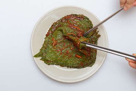 Stewed sesame leaf seasoning neatly in a bowlの写真素材