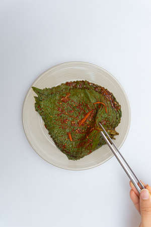 Stewed sesame leaf seasoning neatly in a bowlの写真素材