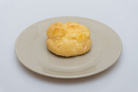 Delicious looking cheese bread in a bowlの写真素材