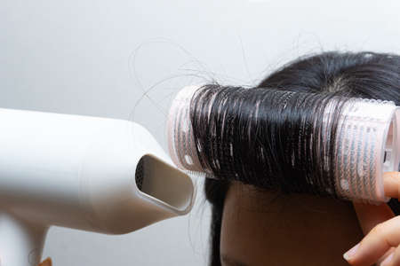 hair rolls for beauty products on a white backgroundの写真素材