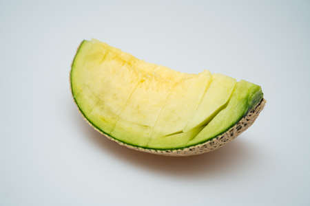 Delicious looking tropical fruit melon on a white backgroundの写真素材