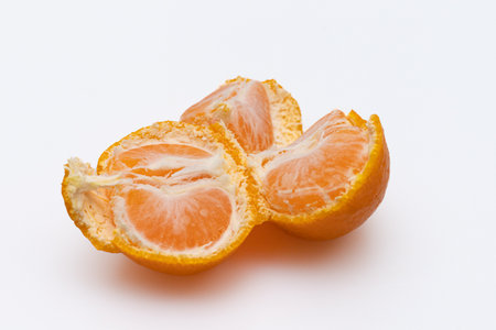 Sweet and delicious looking tangerines concept on white backgroundの写真素材