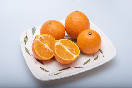 Delicious-looking sour tangerines in a bowlの写真素材