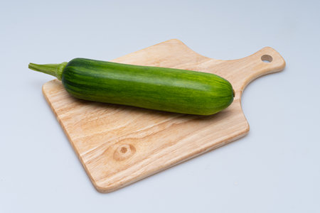 Fresh green(young)pumpkin on a white backgroundの写真素材