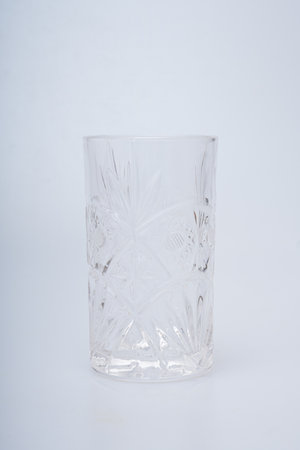 Glasses of various shapes on a white backgroundの写真素材