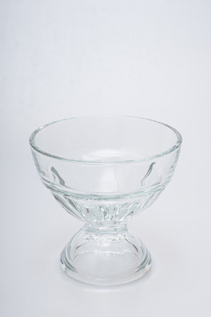 Glasses of various shapes on a white backgroundの写真素材