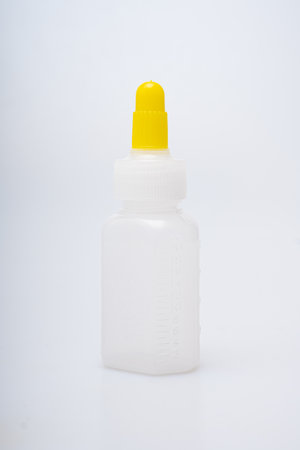 Children's medical potion bottles on a white backgroundの写真素材
