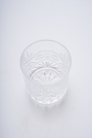 Glasses of various shapes on a white backgroundの写真素材