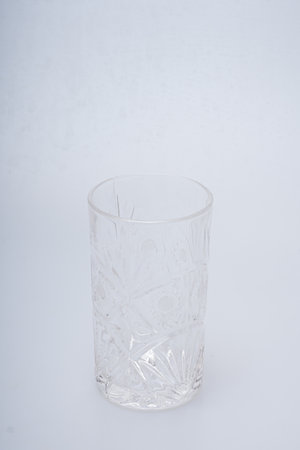 Glasses of various shapes on a white backgroundの写真素材