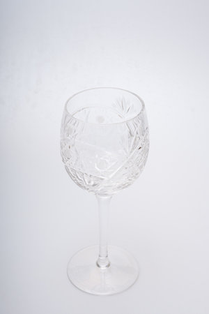 Glasses of various shapes on a white backgroundの写真素材