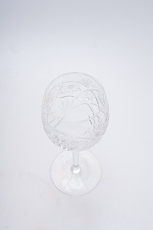 Glasses of various shapes on a white backgroundの写真素材