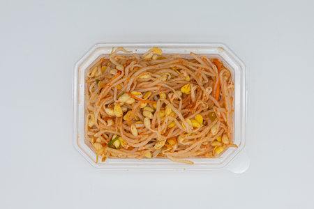Fried bean sprouts in plastic box isolated on white background.の写真素材
