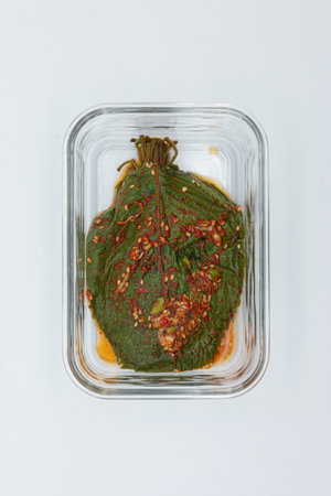 Korean food, dried seaweed in a container on white backgroundの写真素材