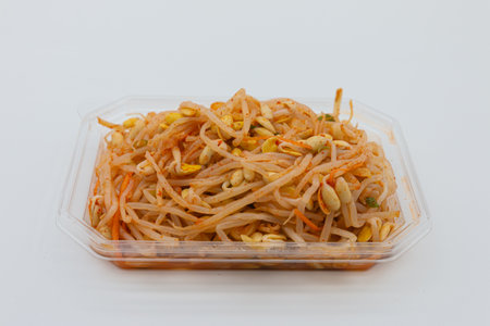 Somtum thai food in plastic box on white backgroundの写真素材