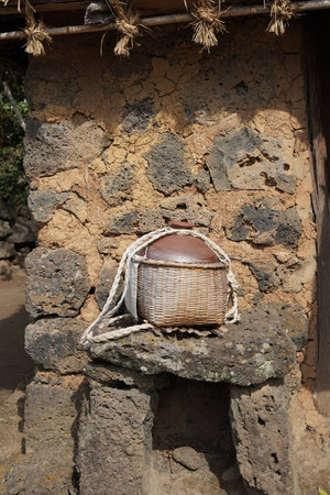 Basket on the wall of a house in the north of Vietnamの写真素材