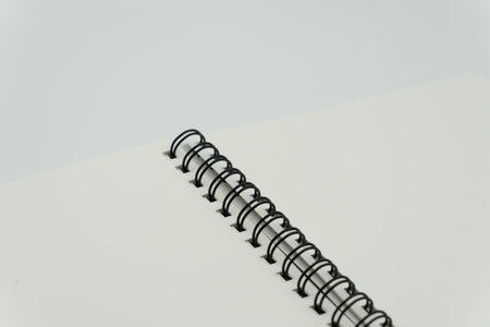 Blank spring note on white backgroundの写真素材