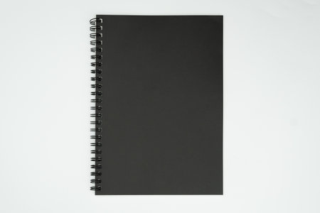 Blank spring note on white backgroundの写真素材