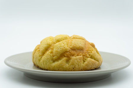 Coconut biscuit on a plate on a white background.の写真素材