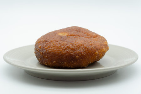 Bread in a plate on a white background. Bakery.の写真素材