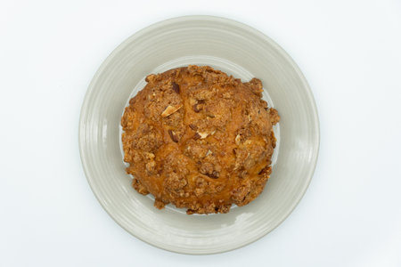 Muffin on a plate isolated on white background. Top view.の写真素材