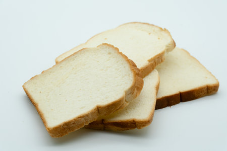 Sliced bread isolated on white background. Close-up.の写真素材