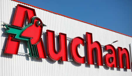 Czestochowa, Poland - 17 March 2020: logo Auchan - delicatessen and supermarket chain stores companyのeditorial素材