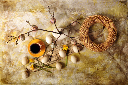 Hgh angle view of eggs, coffee cup and twigs. Photo with digital texture layers.