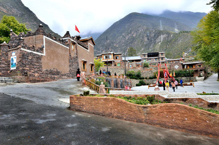 Sichuan, China - October 27, 2013  There are some tourists and villagers walking around the Pingtou Qiang Village which is located at Maoxian のeditorial素材