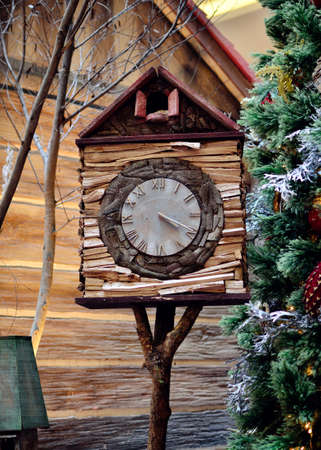 Wooden birdhouse clock
