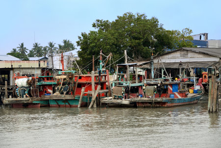 Fishing Boat park along the river at Bagan, Sekinchan Kuala Selangorのeditorial素材