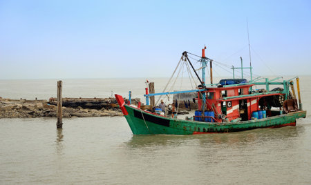 Kuala Selangor,Malaysia - June 15, 2013  The fisherman are packing up their equipment and going back to seaport after catching from the ocean in Fishing Village,Sekinchan のeditorial素材
