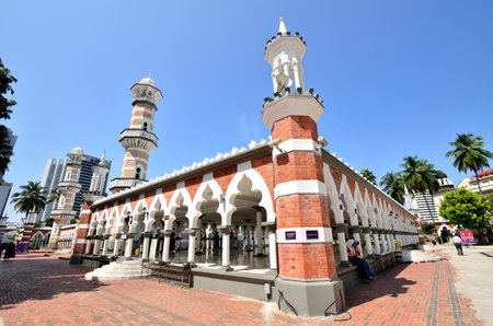Kuala Lumpur,Malaysia- February 16, 2014  Tourists can seen exploring around the Masjid Jamek mosque which is located at the heart of Kuala Lumpur city のeditorial素材