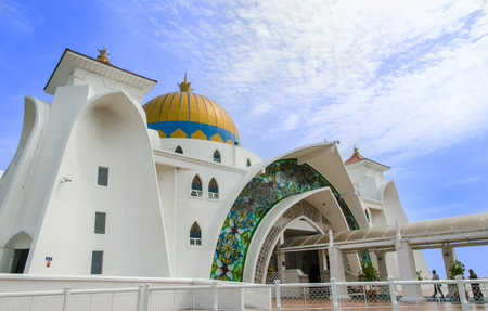 Malacca,Malaysia - June 15, 2014   Malacca Straits Mosque is also known as Malacca s floating mosque as it is built on stilts above the sea,it looks like floating structure if the water level is high のeditorial素材