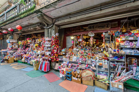 Jiufen,Taiwan - March 18,2015 : The shops in Jiufen Old Street are vending the most famous country snack of Jiufen, and various local accessories.のeditorial素材