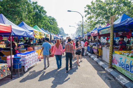 Kuala Lumpur,Malaysia - July 5, 2015: People seen walking and buying foods around the Ramadan Bazaar.It is established for muslim to break fast during the holy month of Ramadan.のeditorial素材