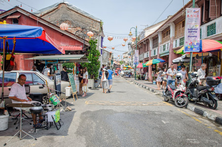 Georgetown,Penang - July 17,2015 : People can seen walking and exploring around the street art in Georgetown, Penangのeditorial素材