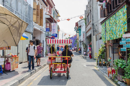 Georgetown,Penang - July 17,2015 : People can seen walking and exploring around the street art in Georgetown, Penangのeditorial素材