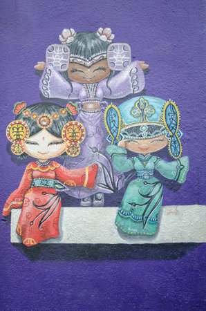 Georgetown,Penang - July 17,2015 : Three Chinese dolls painting on the street wall at the street art in Georgetown, Penangのeditorial素材