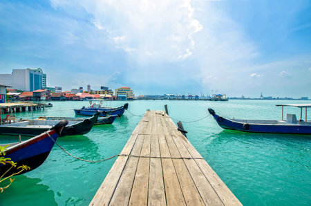 Penang,Malaysia - July 17,2015 : Boats at the Chew Jetty which is one of the UNESCO World Heritage Site in Penang.のeditorial素材