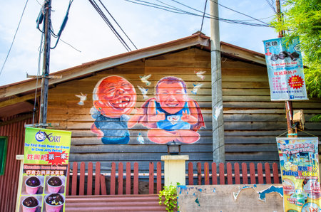 Penang,Malaysia - July 17,2015 : "Amah  Asoon" mural street art by Simon Tan which is located at Chew Jetty in Penang Malaysia.のeditorial素材